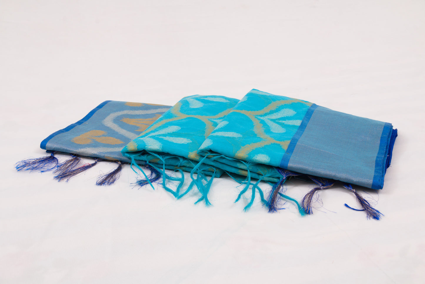 Colorful ethnic saree with handcrafted Ikat patterns and decorative woven border