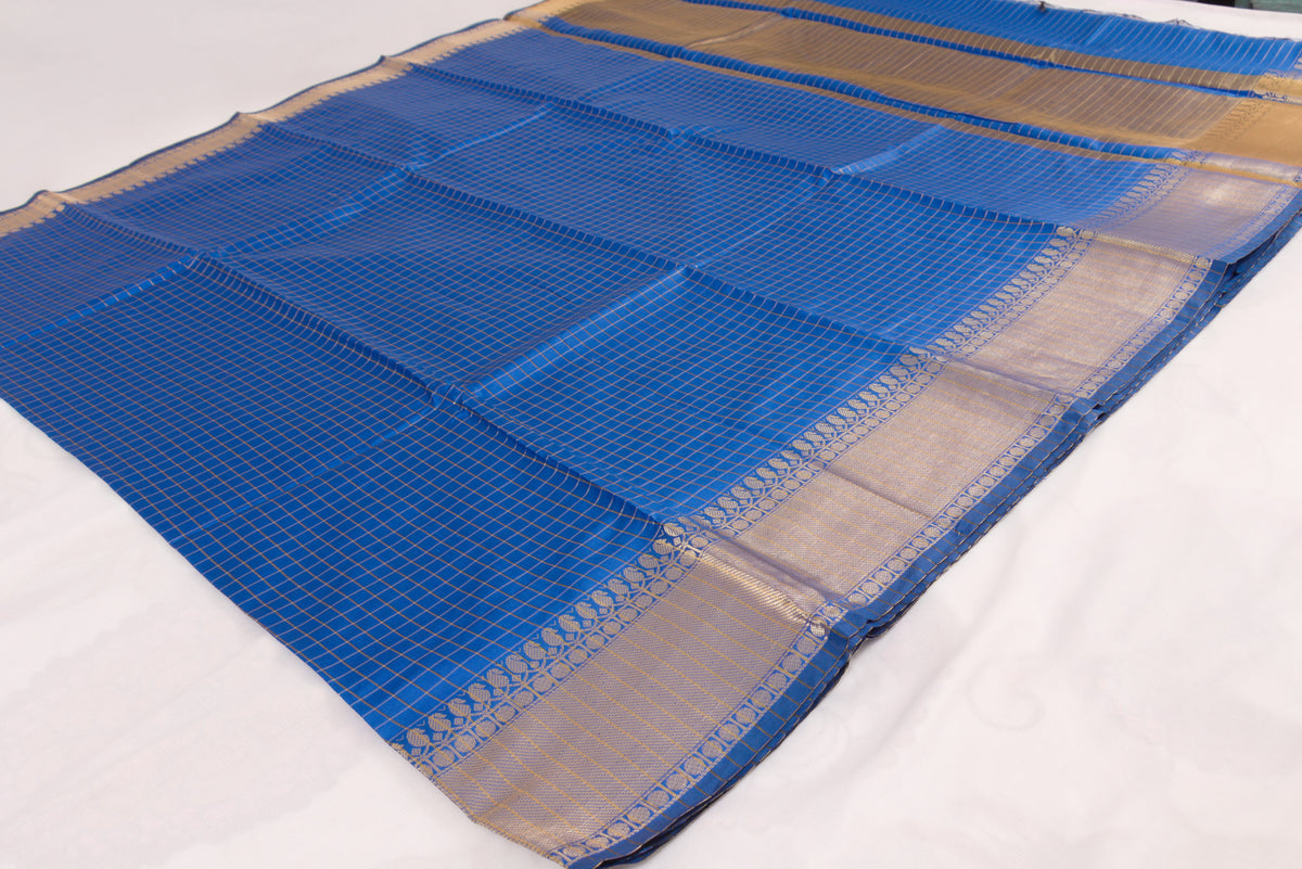 Handwoven Banarasi Semi Katan saree with gold zari floral checkered motifs, check pallu, and luxurious soft drape