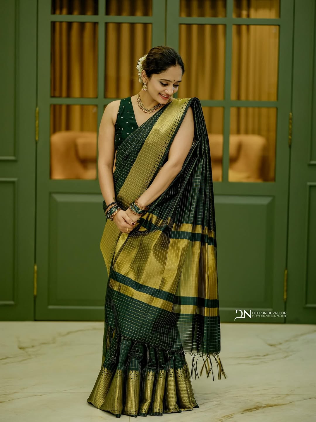 Designer Banarasi Semi Katan Saree with rich gold zari weaving, all-over buti motifs, and premium woven borde
