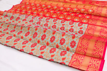 Elampillai Semi-silk sarees – Jacquard Silk – Ultra Soft material – Surf with Coral red floral patterns and red ribbon orange – Tissue silk sarees – Perfect for all occasions – P000267