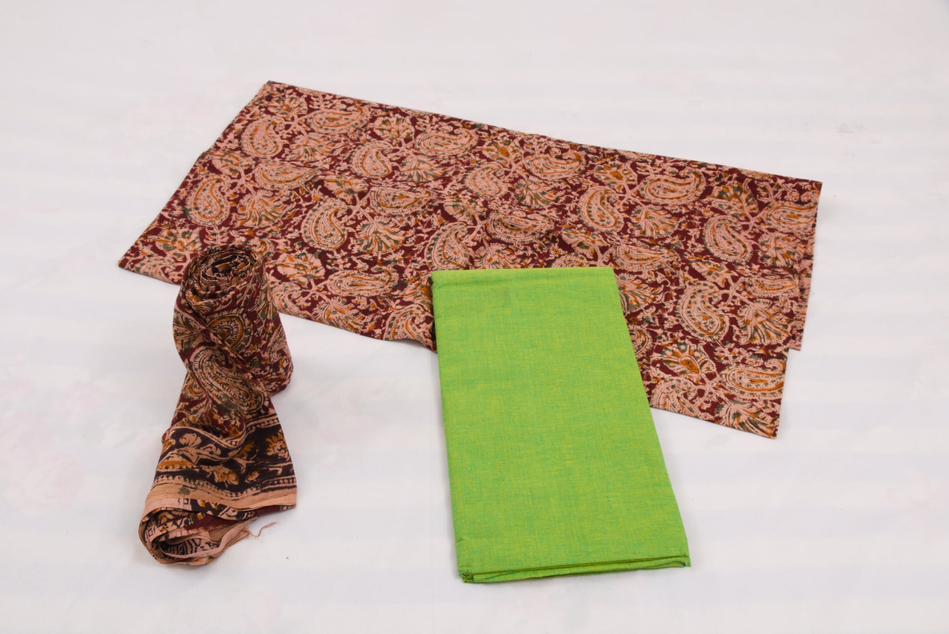 Brown and green Kalamkari printed cotton salwar suit with dupatta