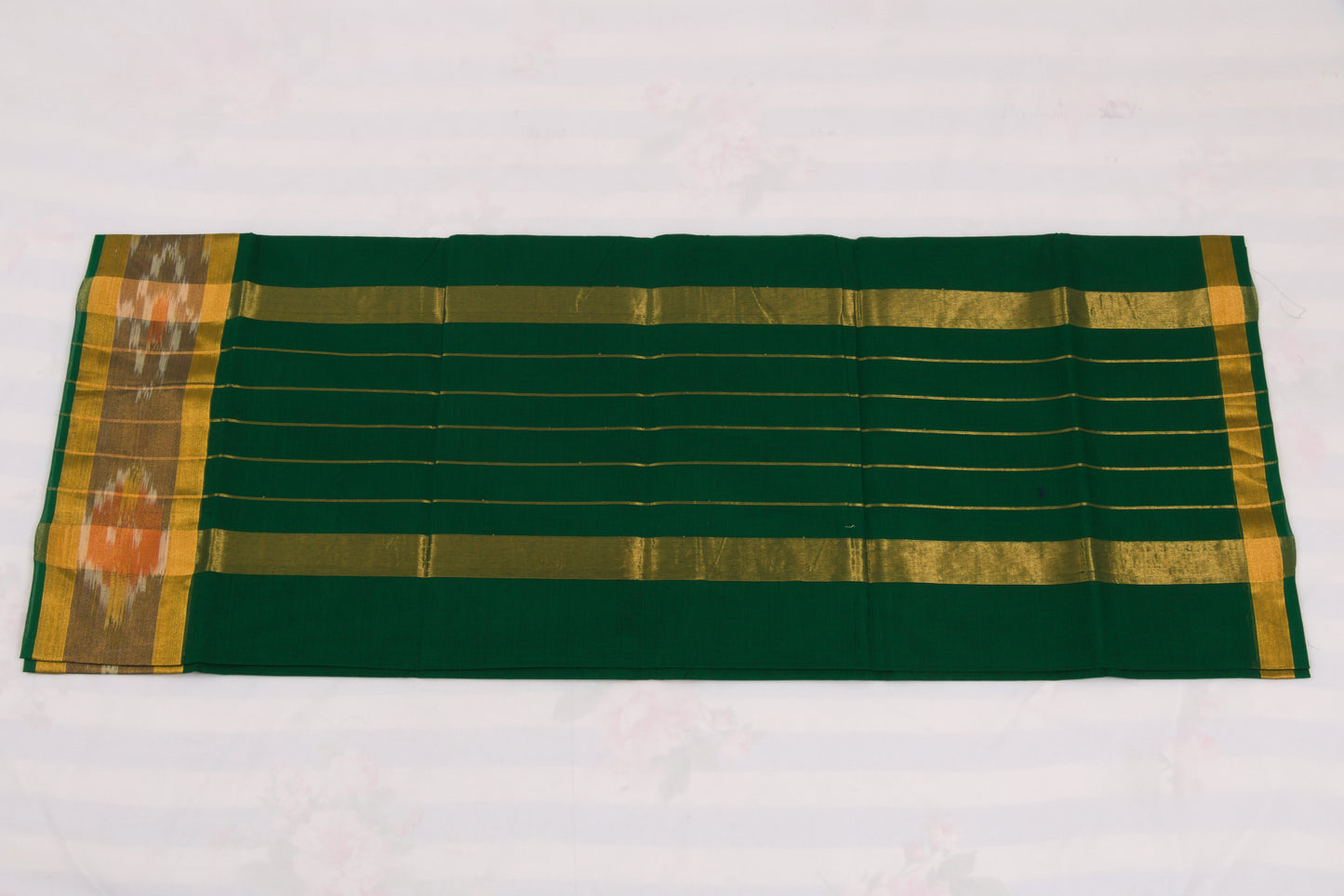 Elegant green Venkatagiri handloom cotton saree with ikat pallu