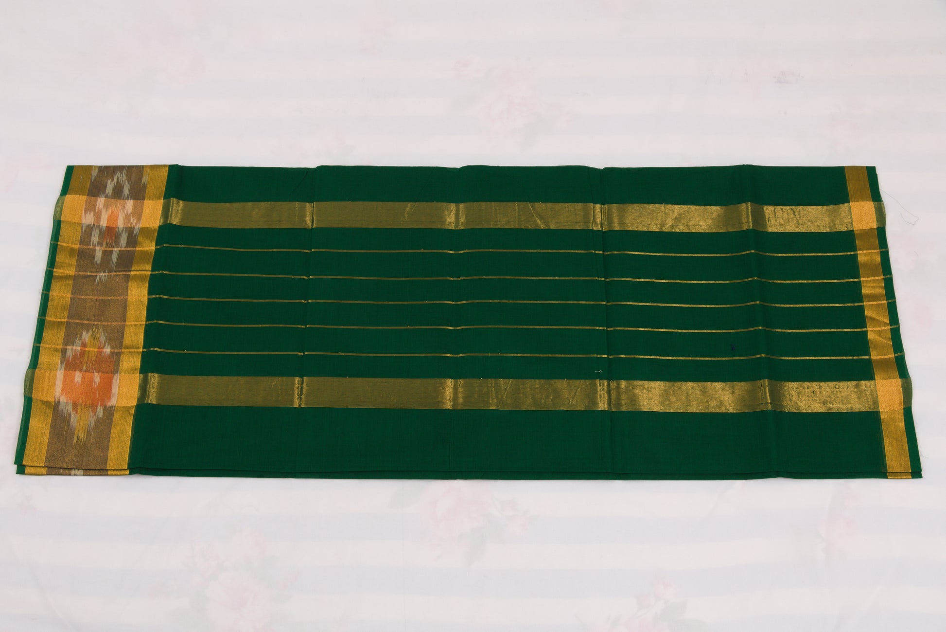 Elegant green Venkatagiri handloom cotton saree with ikat pallu