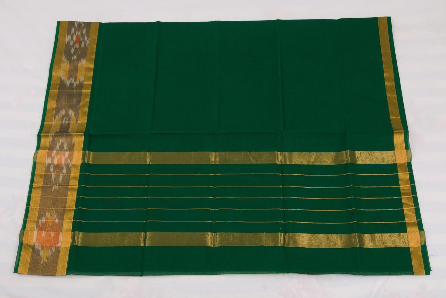 Traditional Venkatagiri cotton saree featuring classic ikat border pattern
