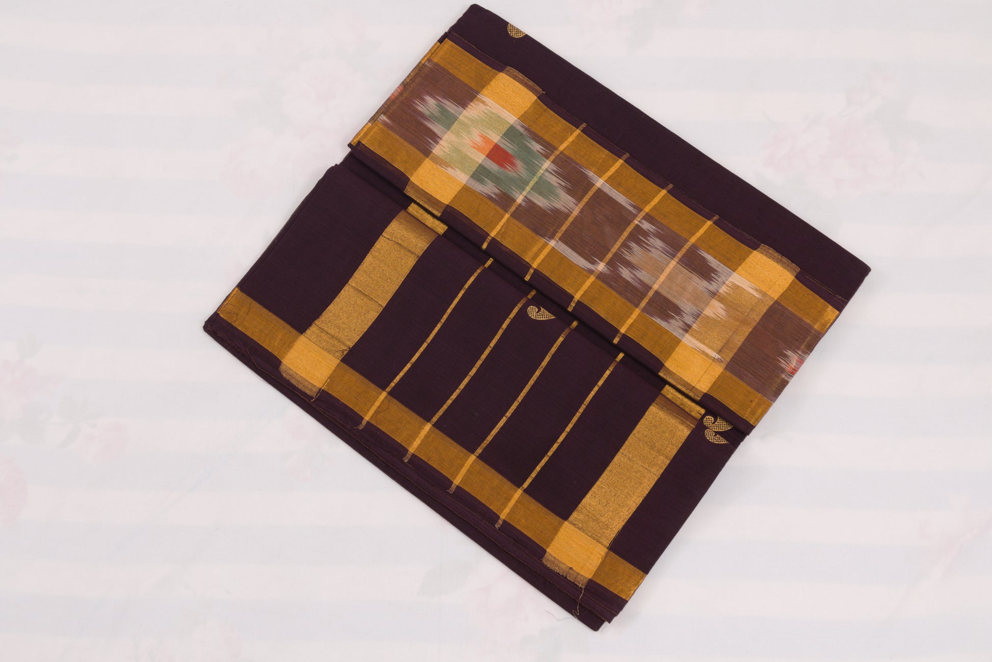 Handwoven Venkatagiri cotton saree in Brown with ikat design border