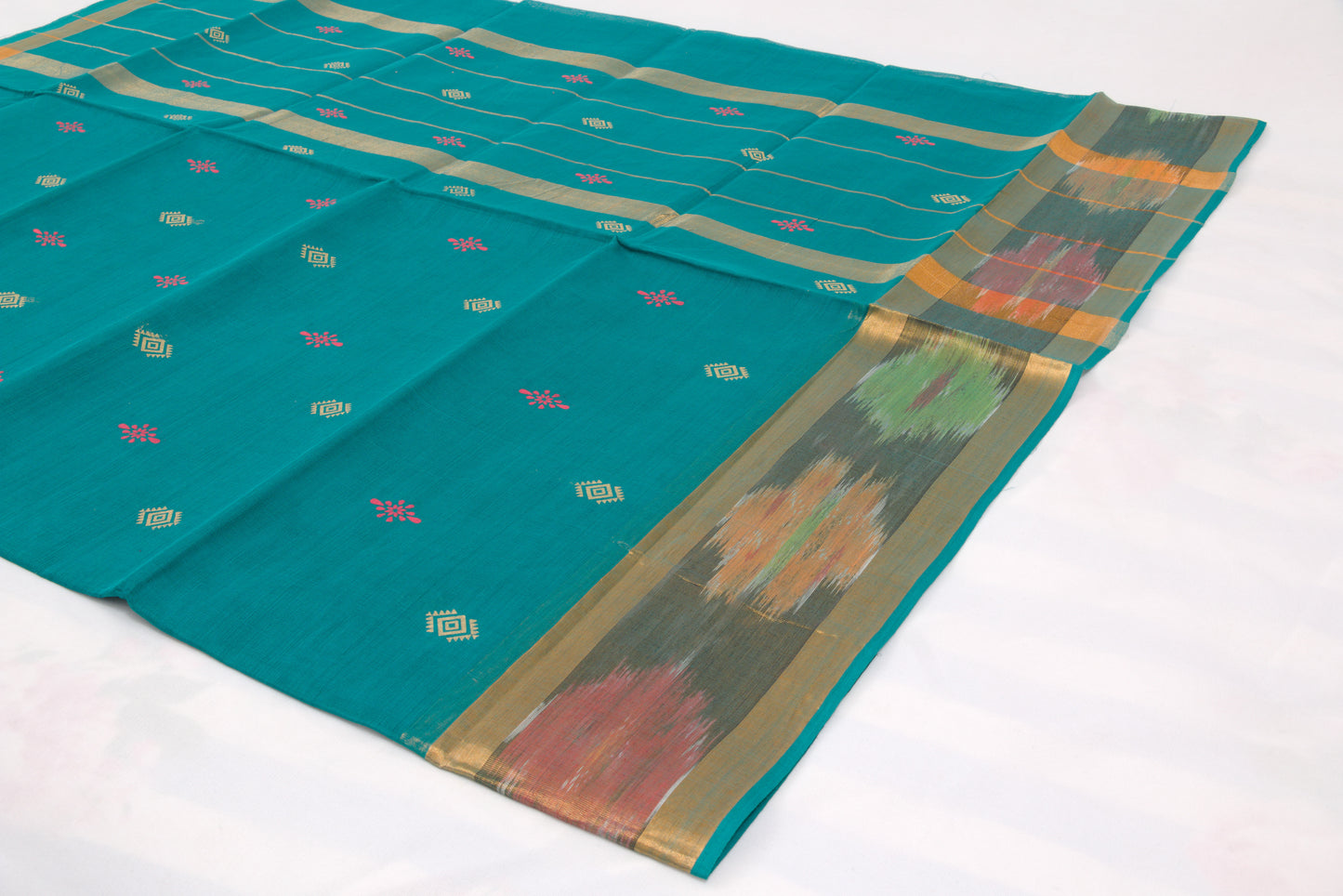 Traditional Venkatagiri cotton saree featuring classic ikat border pattern