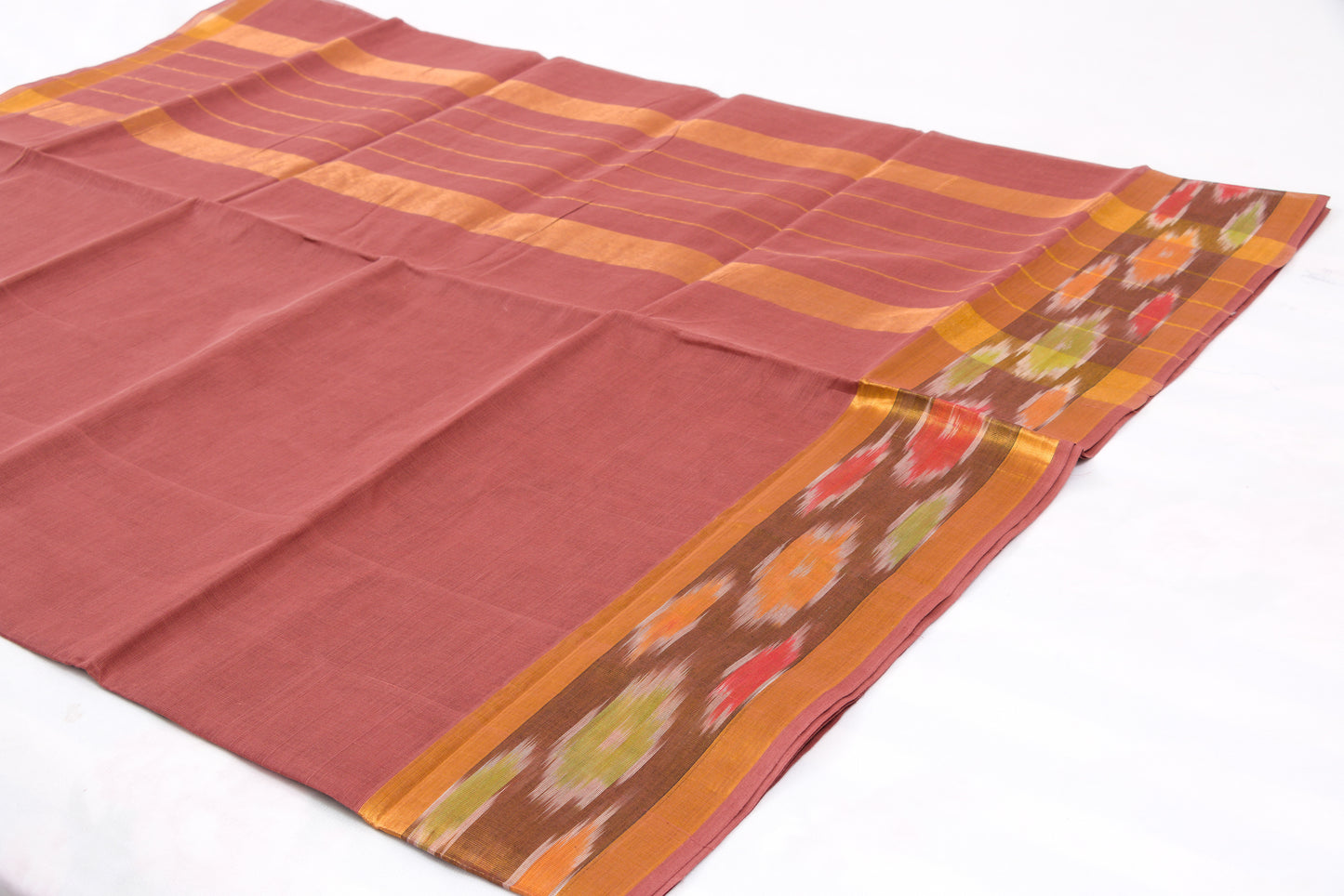 Traditional Venkatagiri cotton saree featuring classic ikat border pattern