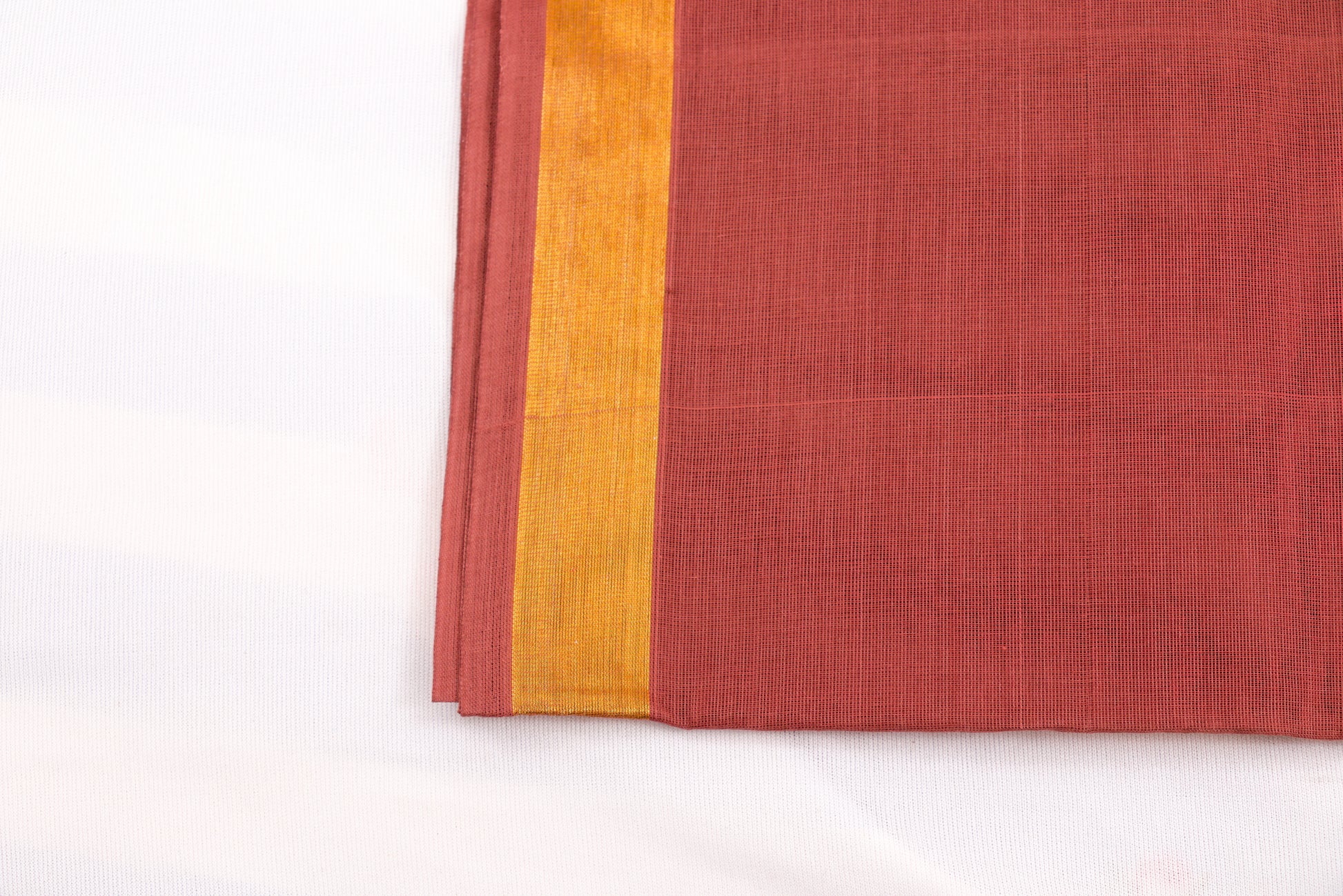 Pure cotton Venkatagiri saree in Maroon with woven ikat border
