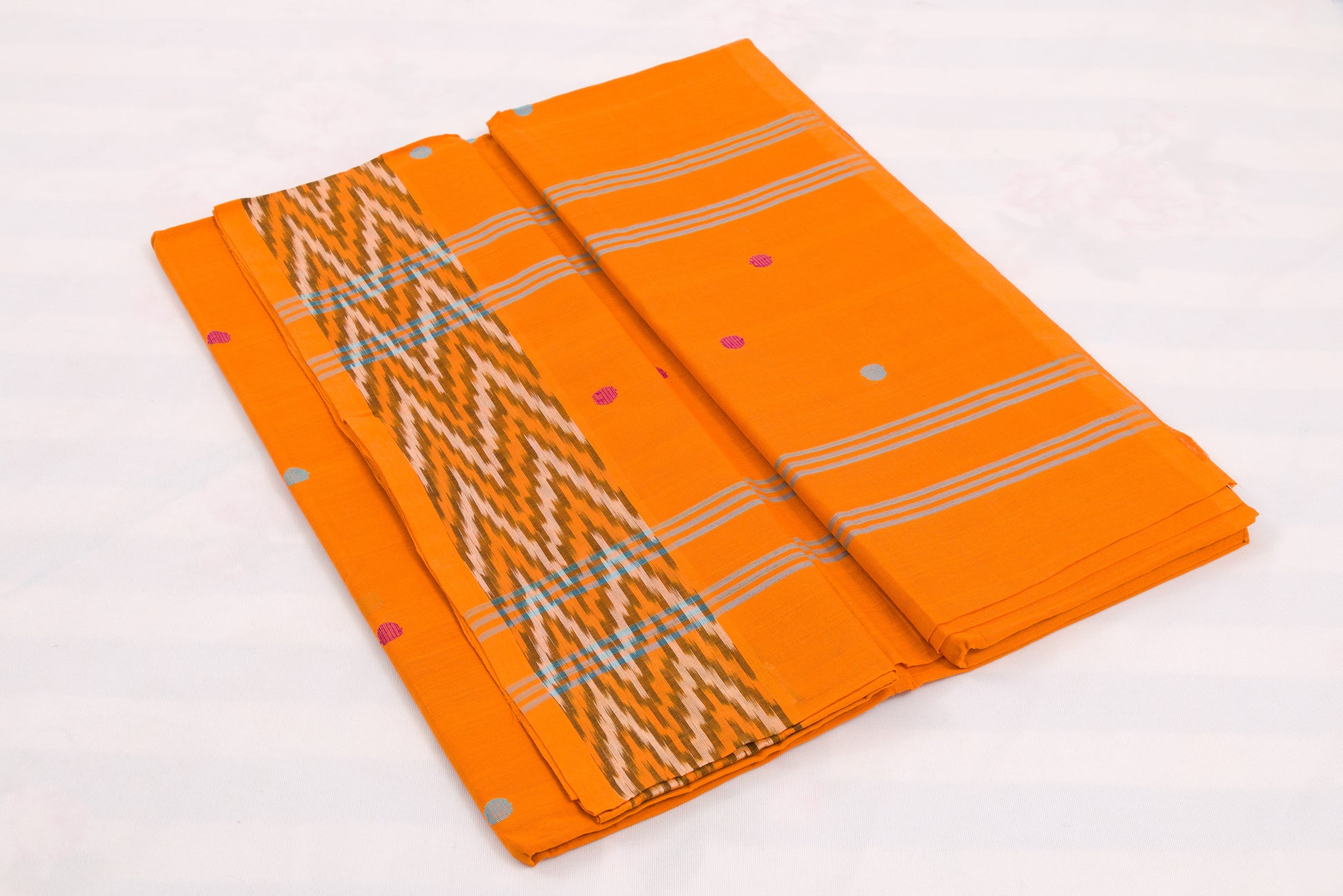 Handwoven Venkatagiri cotton saree with polka dot bhutta design 