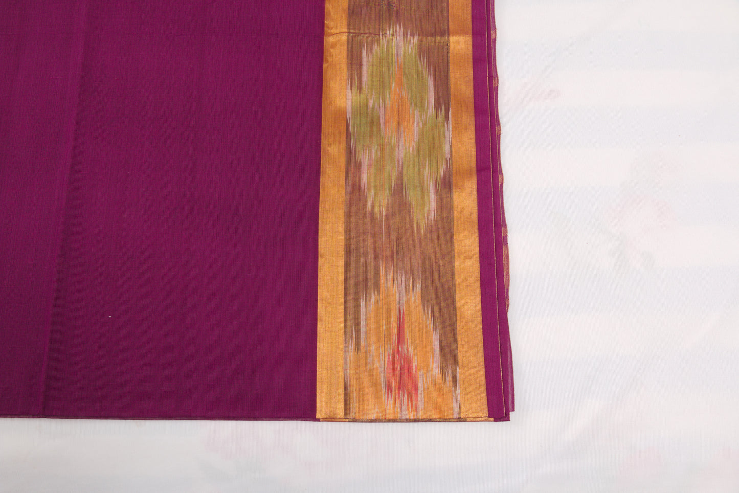 Handloom Venkatagiri saree in wine berry with ikat border  