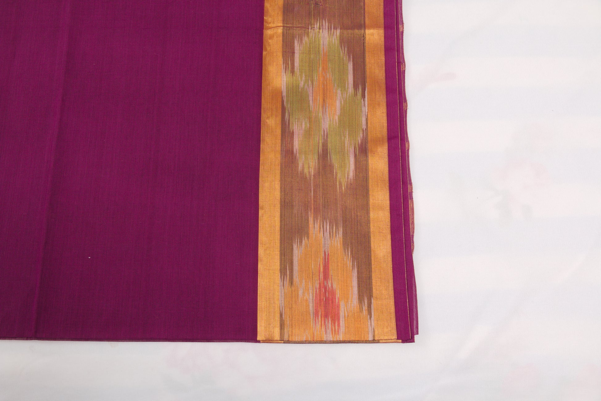 Handloom Venkatagiri saree in wine berry with ikat border  