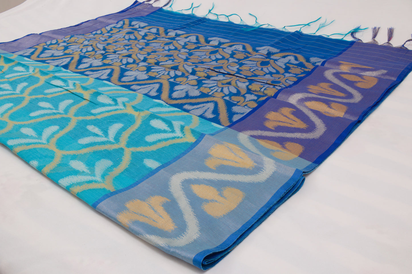 Festive Pochampally saree with geometric motifs, floral pallu, and woven elegance 