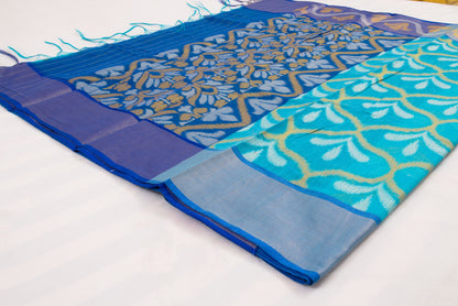 Traditional Telangana saree with detailed Ikat weaving and rich contrast border 