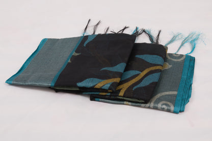 Elegant Pochampally Ikat silk saree with intricate woven designs and tassel detailing 