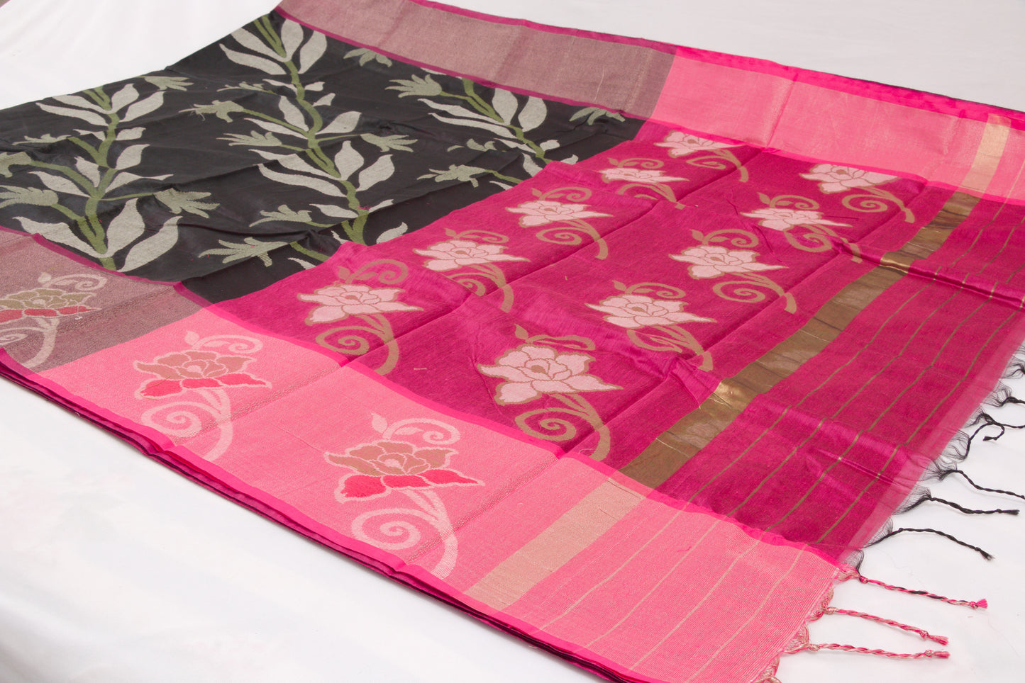 Elegant Pochampally Ikat silk saree with intricate woven designs and tassel detailing 