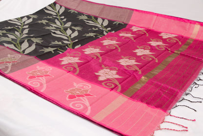 Elegant Pochampally Ikat silk saree with intricate woven designs and tassel detailing 