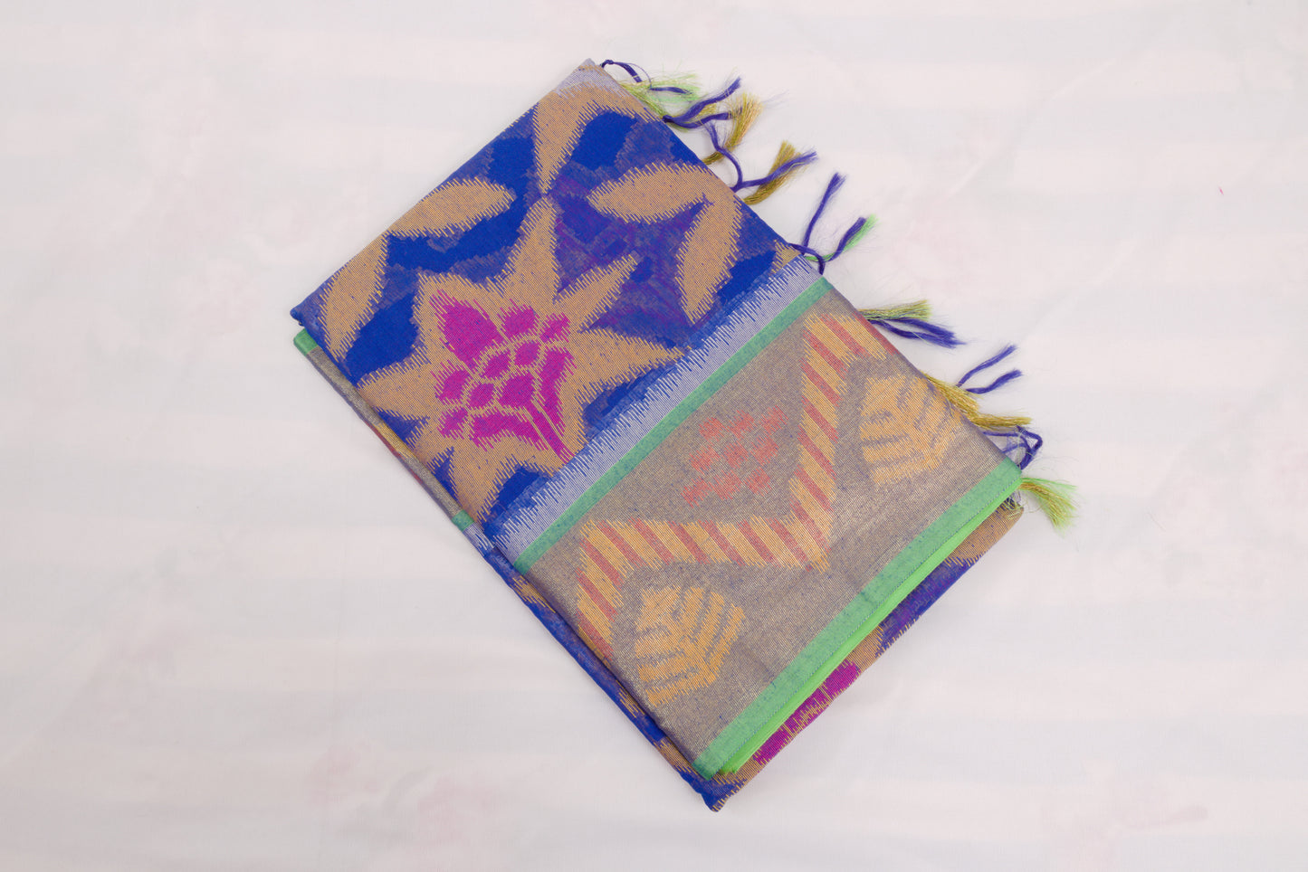 Festive Pochampally saree with geometric motifs, floral pallu, and woven elegance 