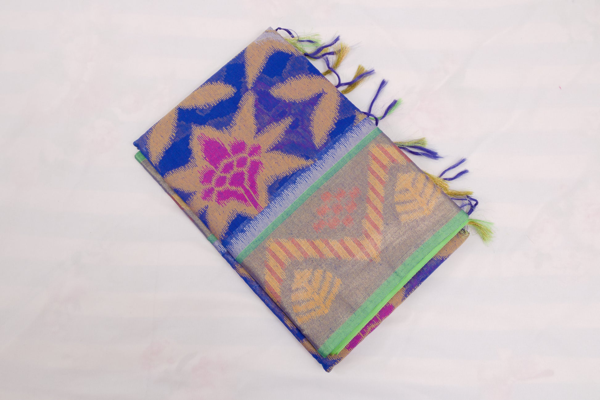 Festive Pochampally saree with geometric motifs, floral pallu, and woven elegance 