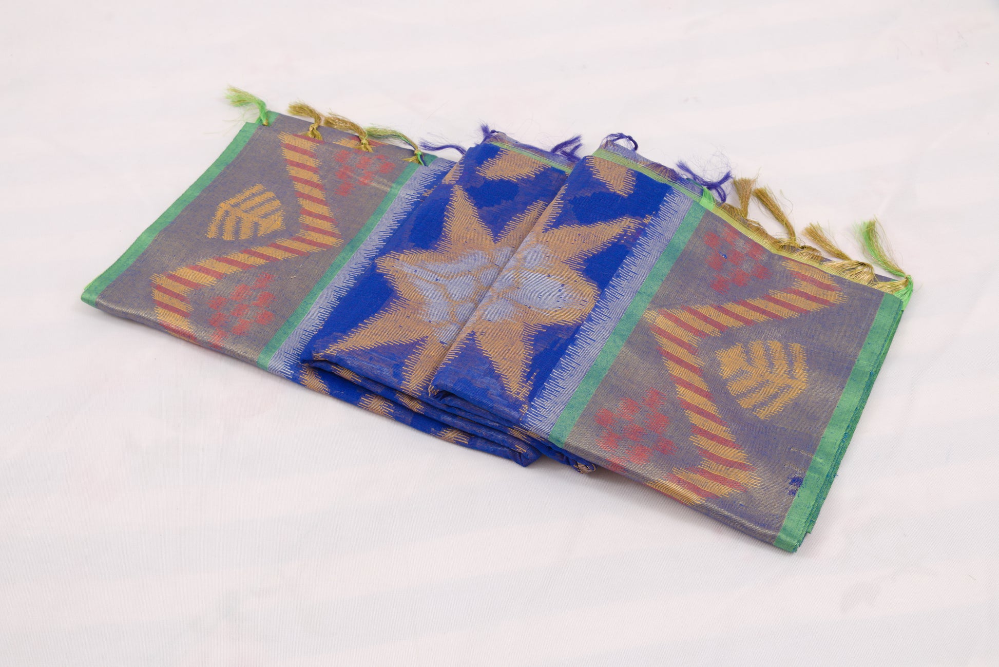 Designer Ikat saree with and intricate green pallu patterns 