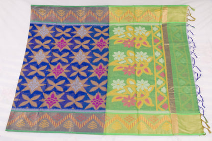 Traditional Indian handloom saree with blue geometric body and green floral border 