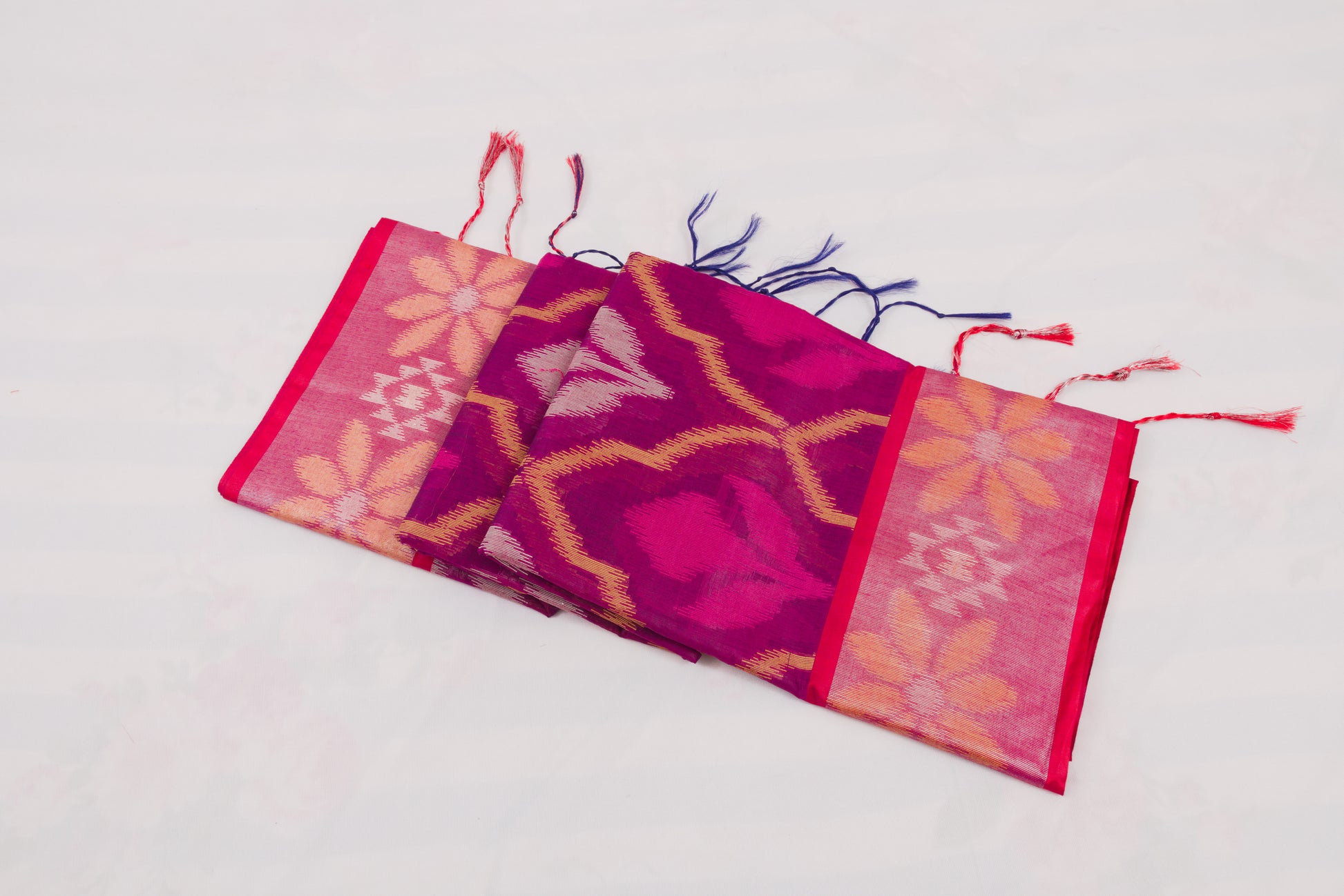 Traditional Telangana handloom saree with detailed Ikat weaving and rich contrast border 