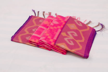 Colorful ethnic saree with handcrafted Ikat patterns and decorative woven border 