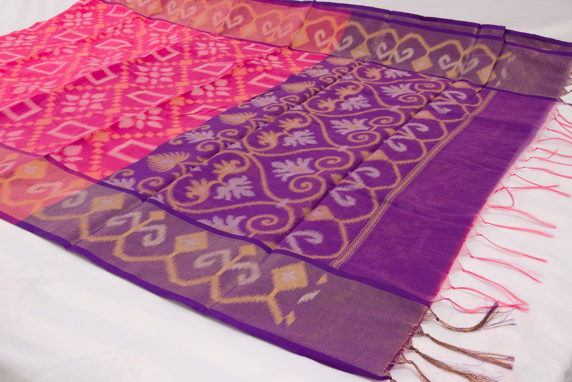 Artisan-crafted Pochampally saree in vibrant pink and purple combination 