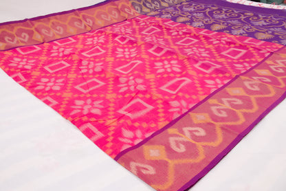 Traditional Telangana handloom saree with detailed Ikat weaving and rich contrast border 