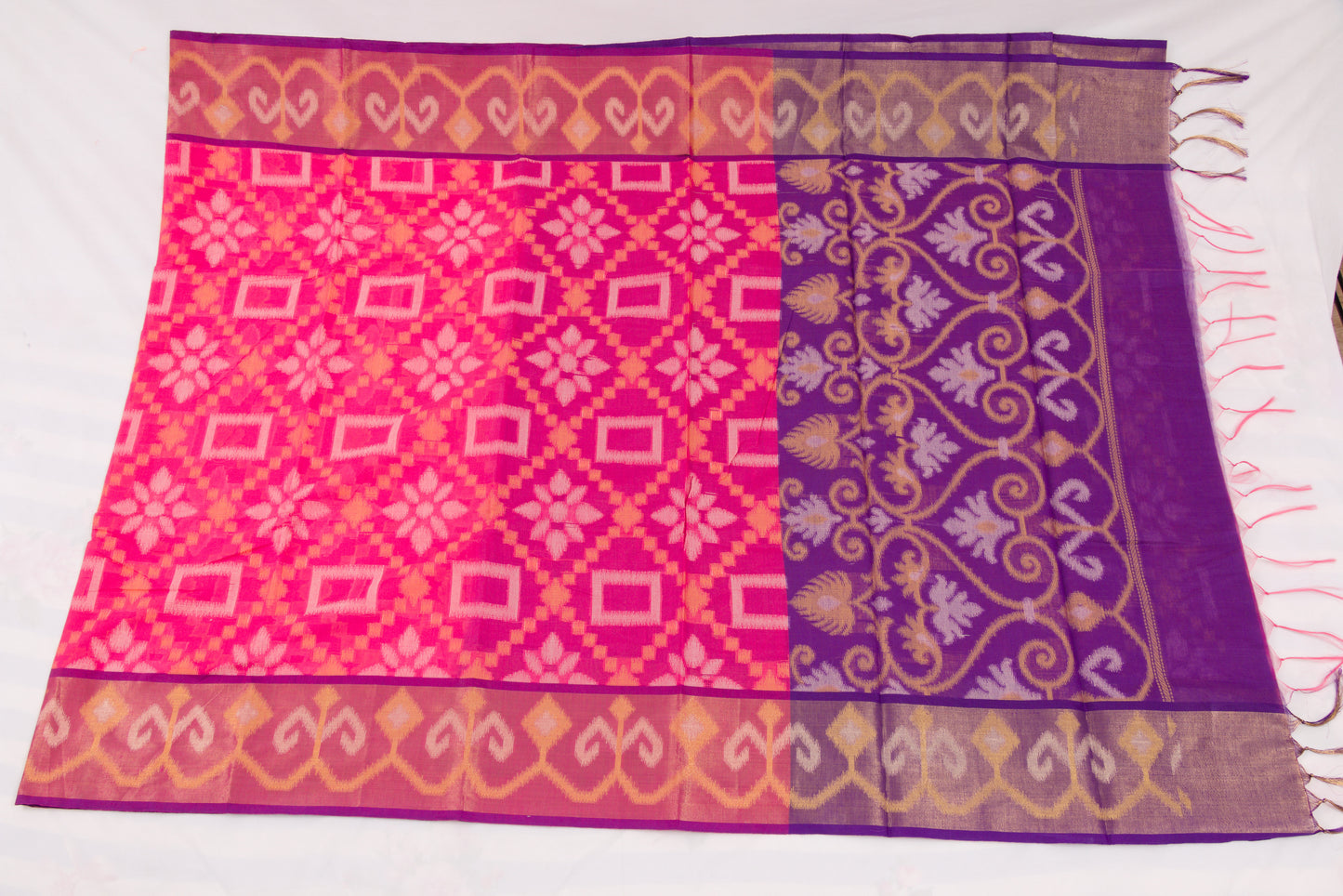 Festive Pochampally saree with geometric motifs, floral pallu, and woven elegance 