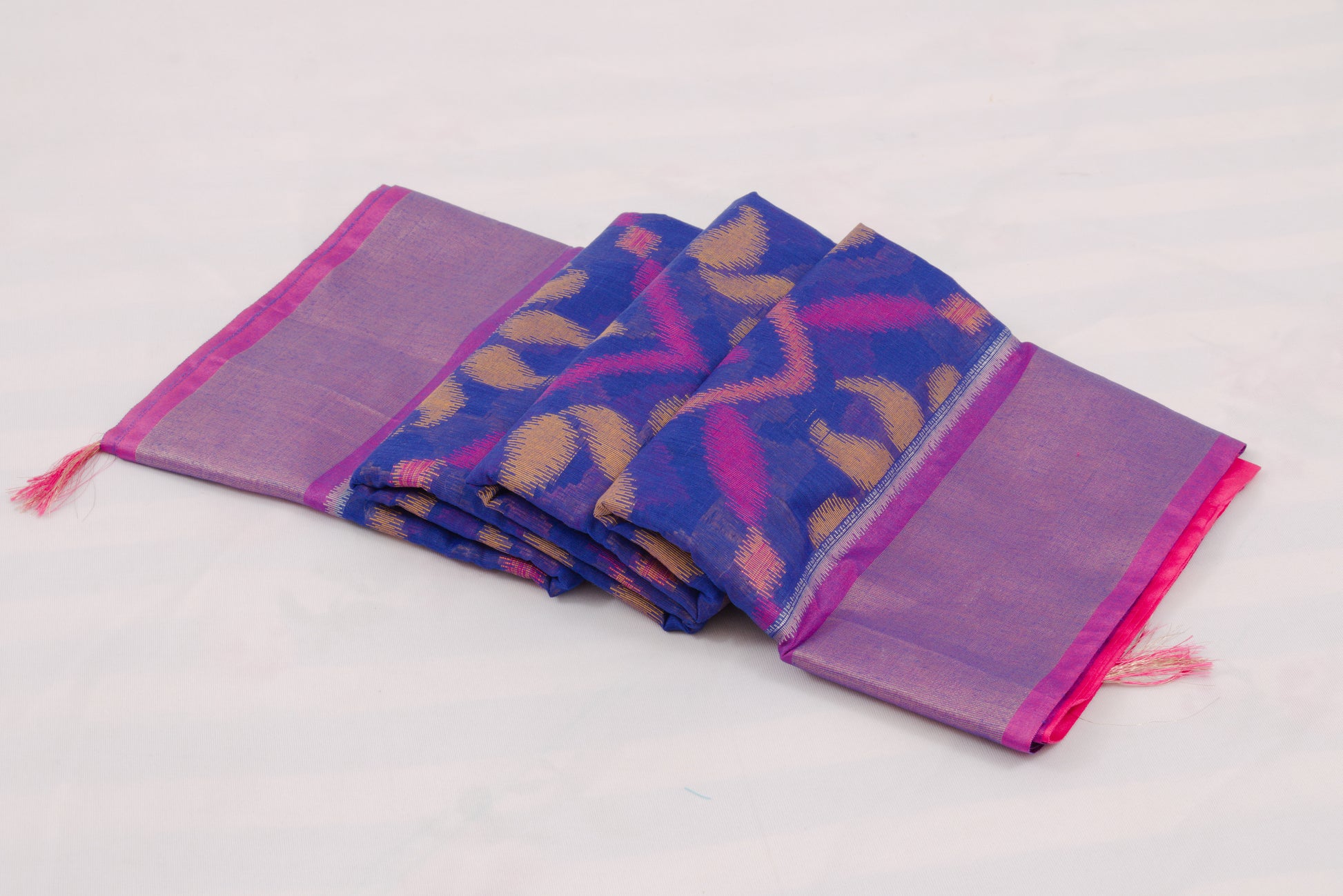 Traditional Indian handloom saree with blue geometric body and floral border 