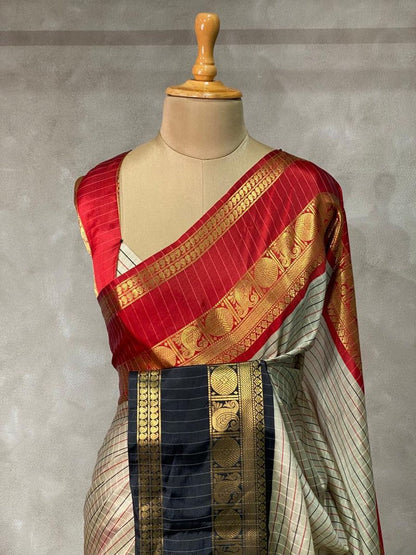 Grey silk saree with traditional Banarasi motifs and lustrous zari work 