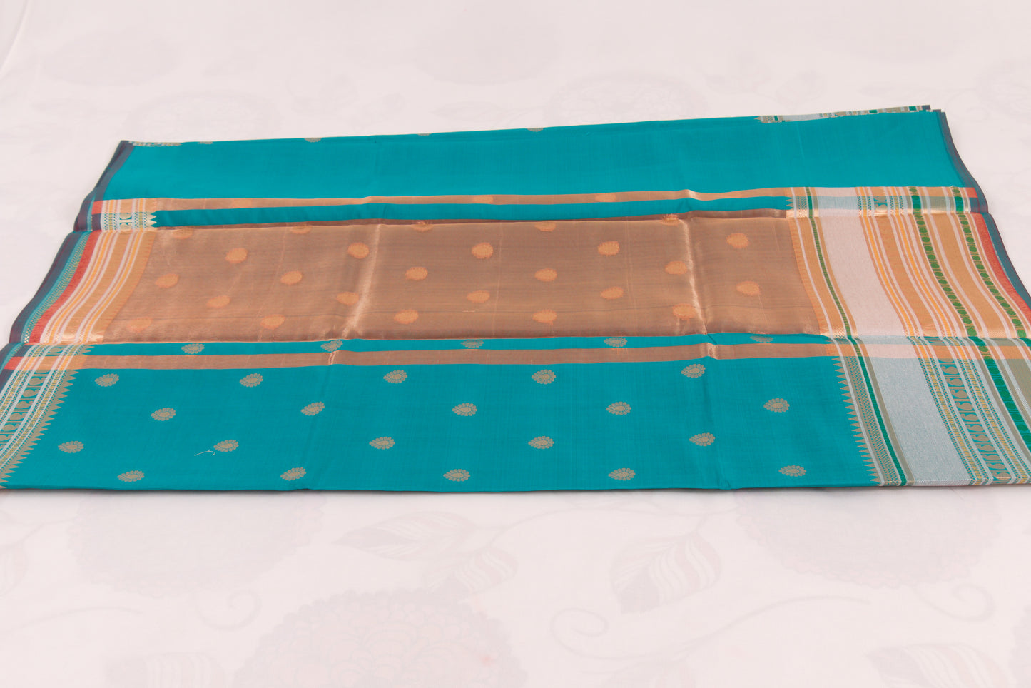 Handwoven Banarasi Semi Katan saree with gold zari floral buti motifs, check pallu, and luxurious soft drape