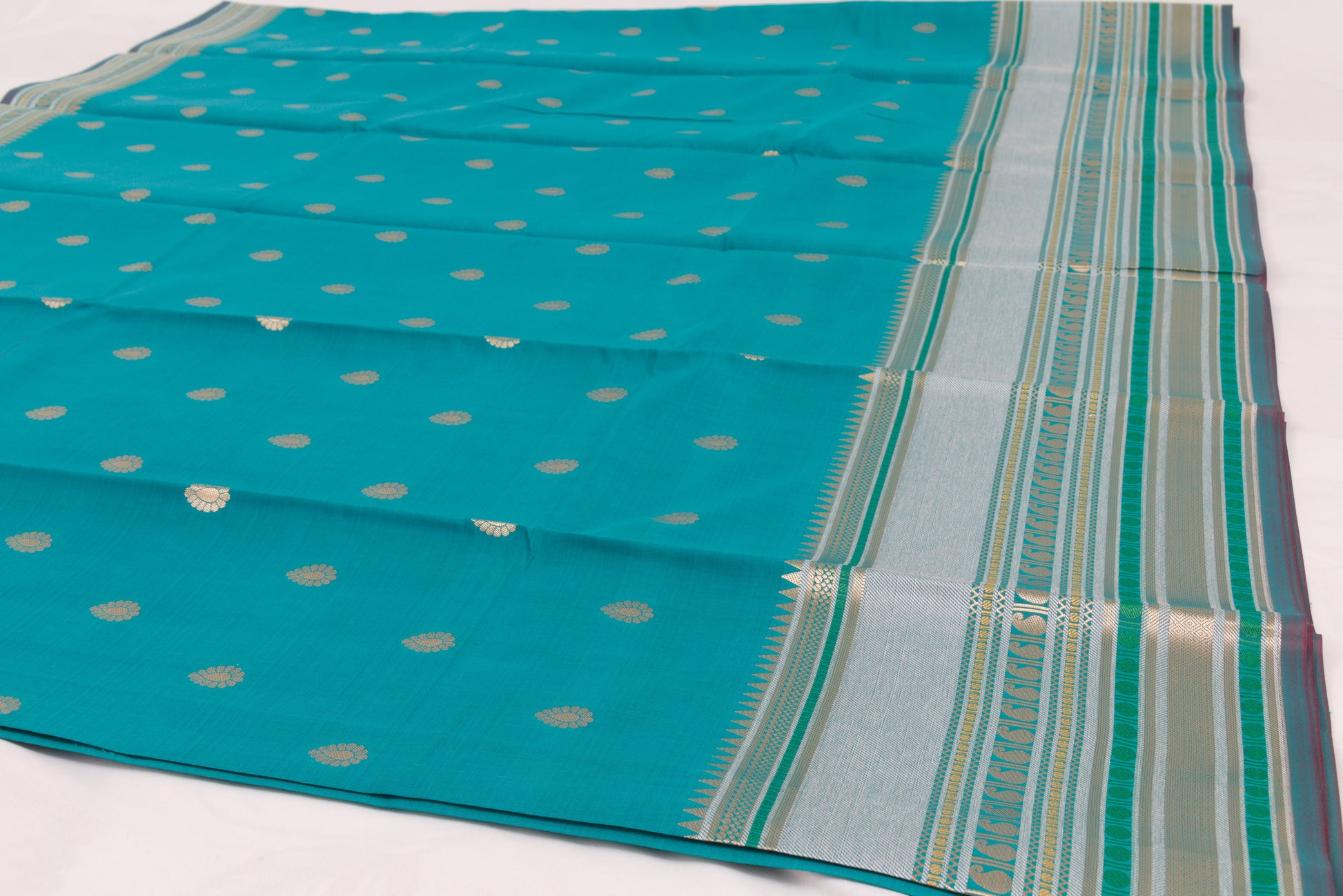 Designer Banarasi Semi Katan Saree with rich gold zari weaving, all-over buti motifs, and premium woven border