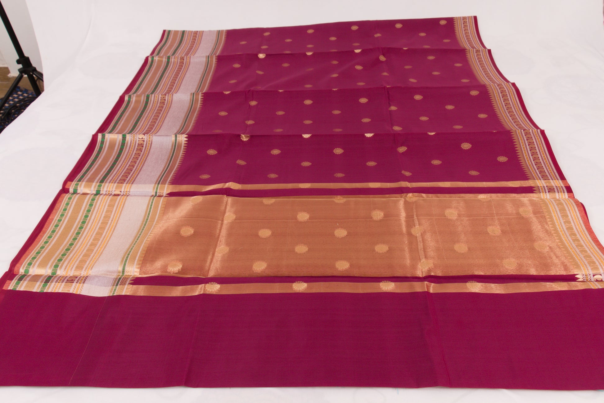 Handwoven Banarasi Semi Katan saree with gold zari floral buti motifs, check pallu, and luxurious soft drape