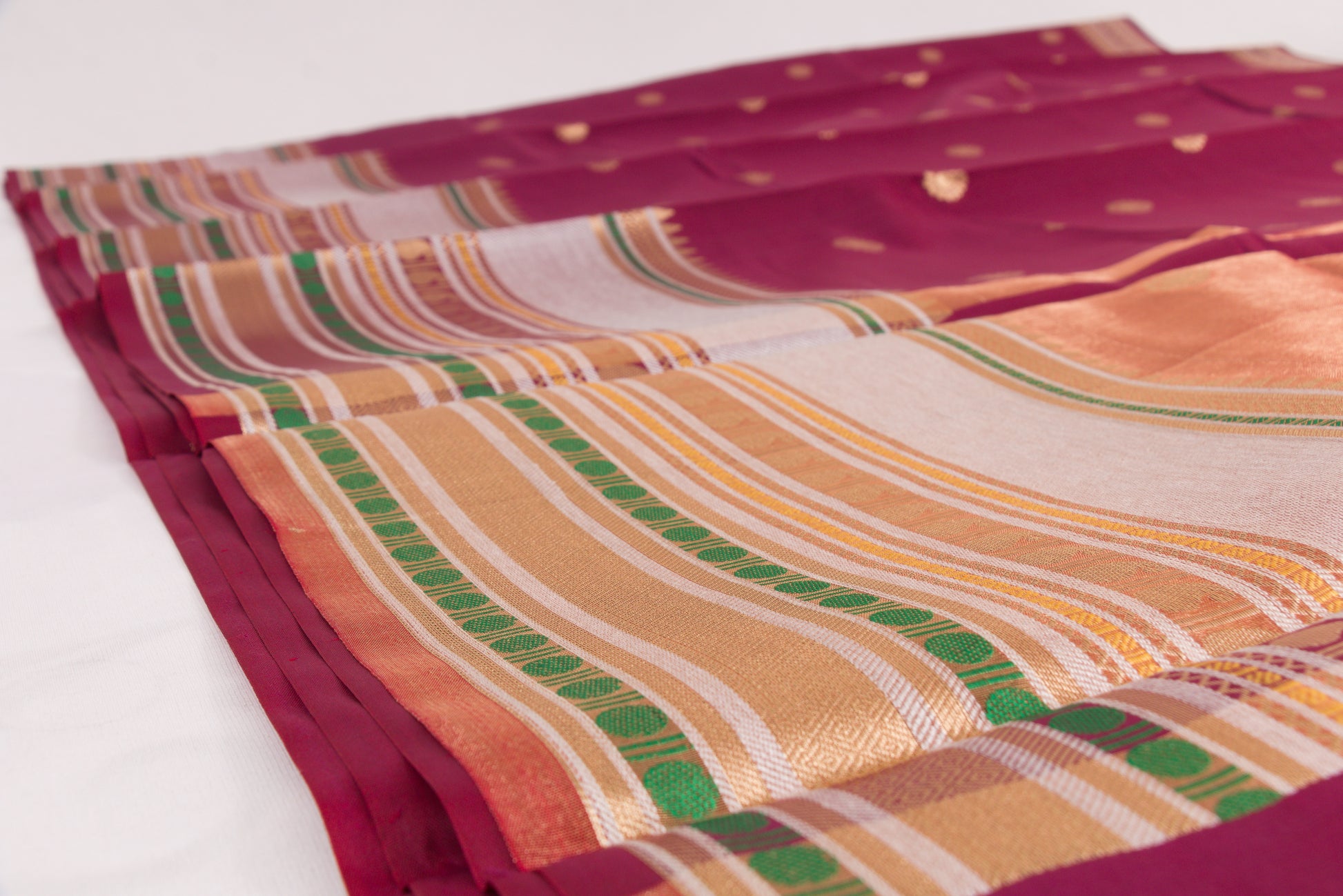 Elegant Rosebud Banarasi Semi Katan saree with intricate gold zari buti design, traditional woven border, and blouse piece
