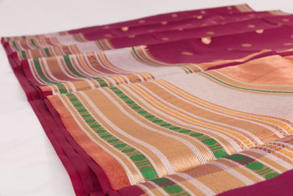 Elegant Rosebud Banarasi Semi Katan saree with intricate gold zari buti design, traditional woven border, and blouse piece