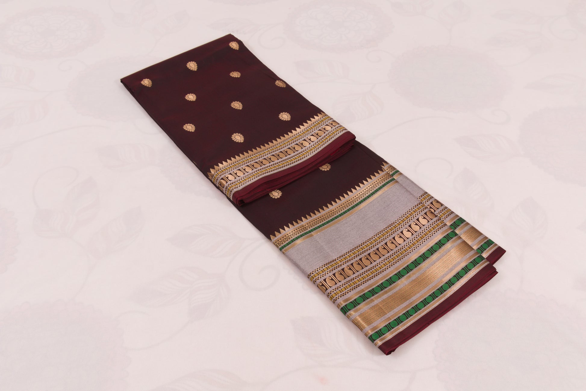 Elegant Woody Banarasi Semi Katan saree with intricate gold zari buti design, traditional woven border, and blouse piece