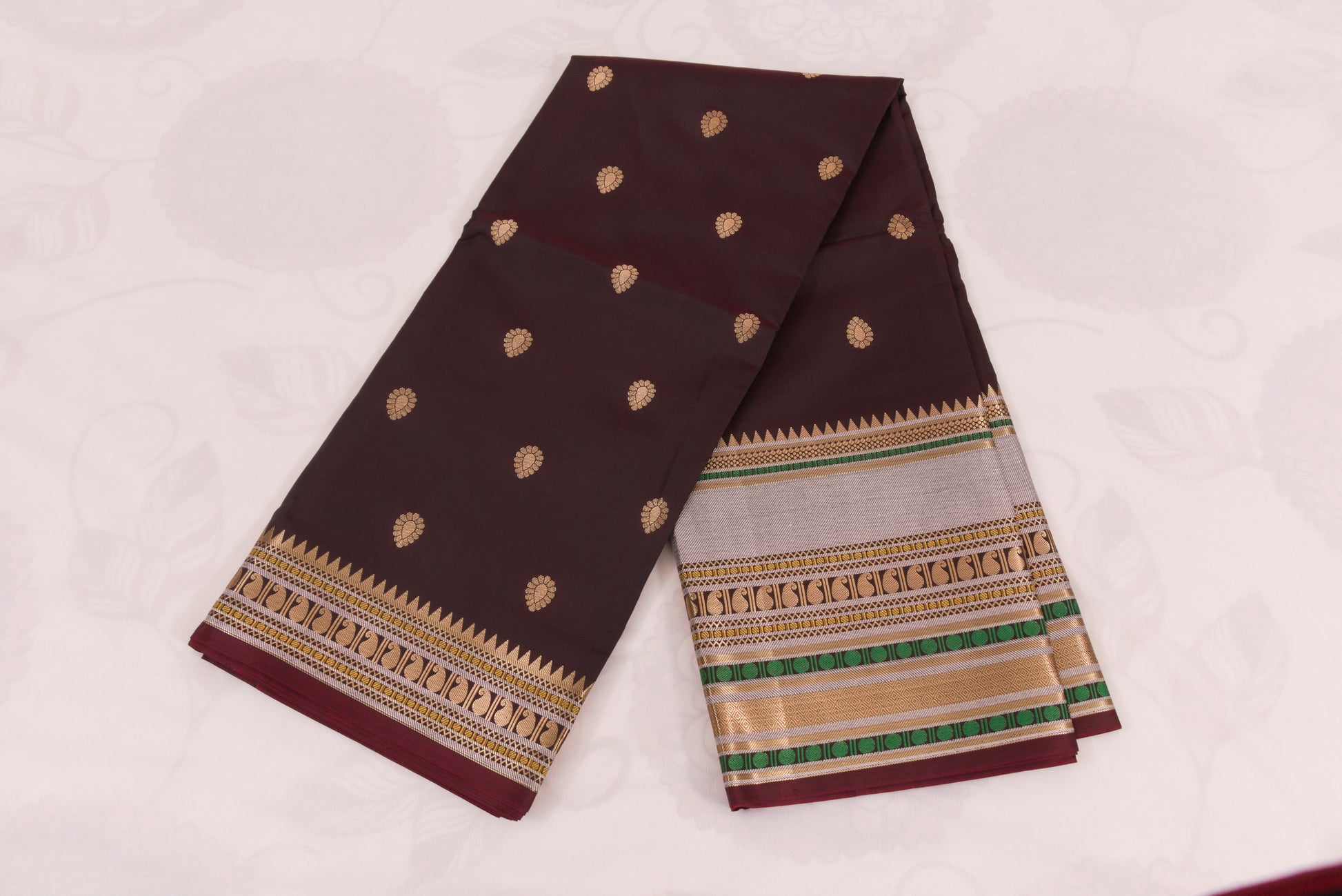 Handwoven Banarasi Semi Katan saree with gold zari floral buti motifs, check pallu, and luxurious soft drape