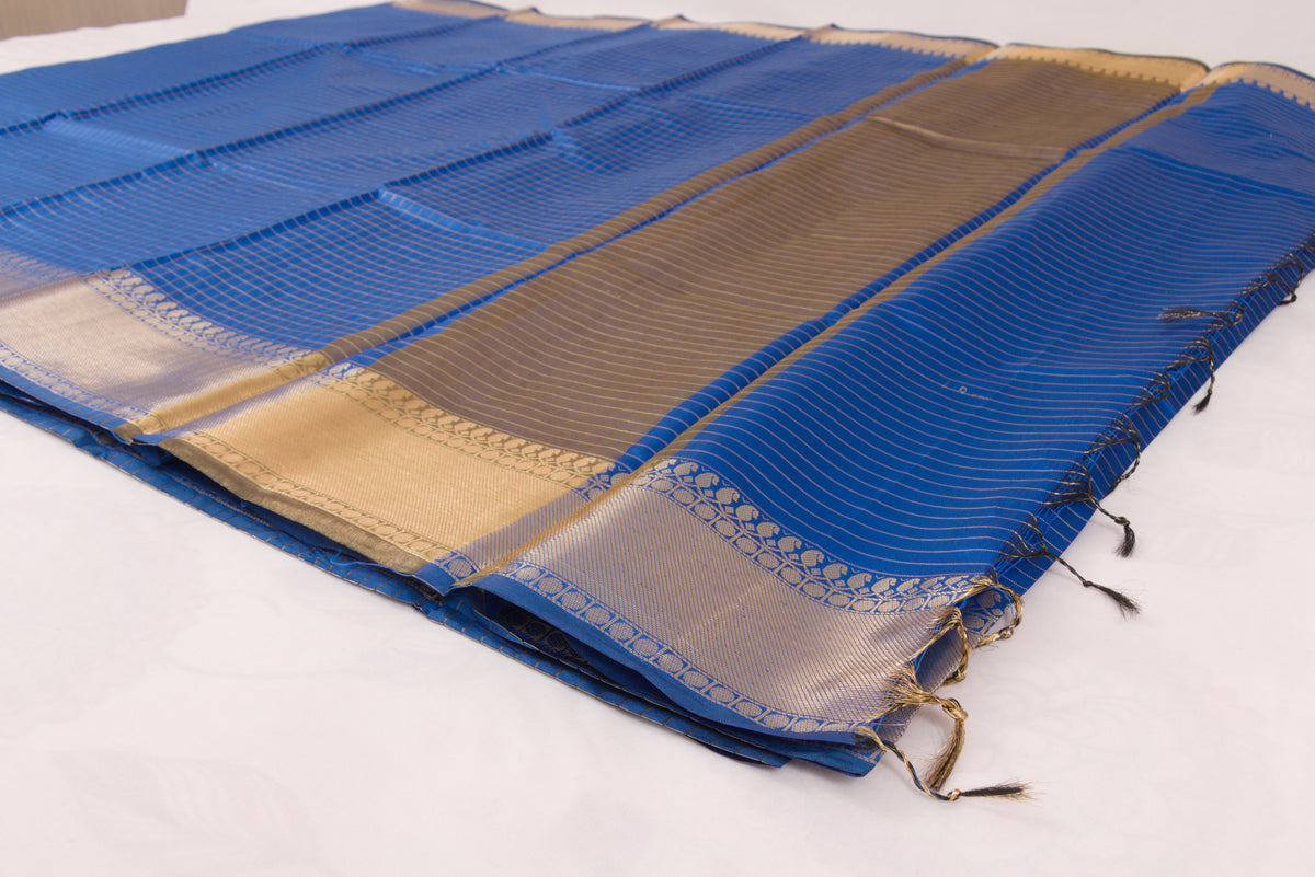 Handwoven Banarasi Semi Katan saree with gold zari floral checkered motifs, check pallu, and luxurious soft drape