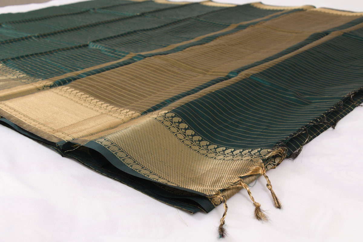 Designer Banarasi Semi Katan Saree with rich gold zari weaving, all-over buti motifs, and premium woven border